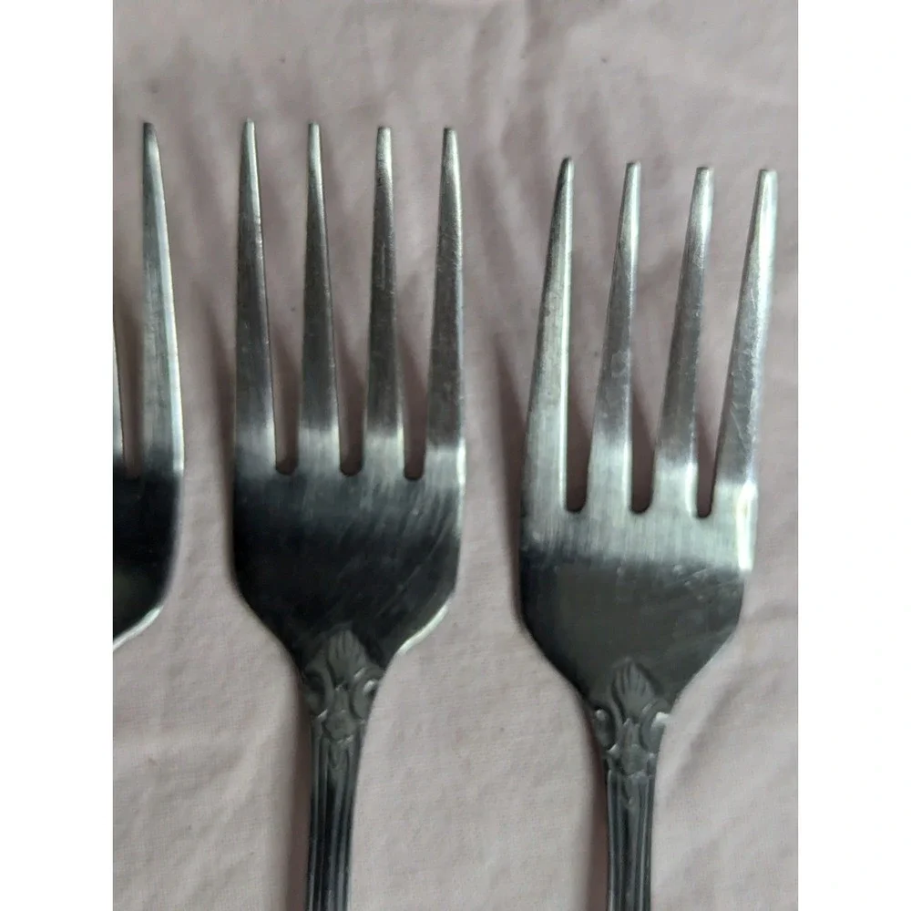 7 lot H.F. LTD Stainless stamped flower pattern 7